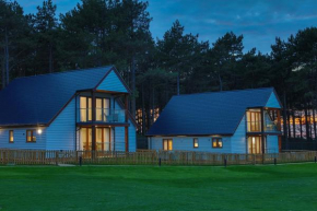 Le Strange Arms Garden Lodges